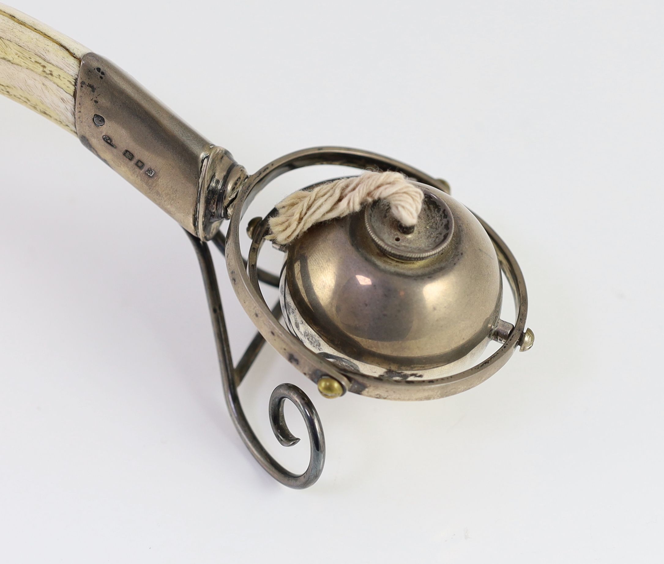 A 1930's silver spherical gimbal club lighter, with tusk handle, by Padgett & Braham Ltd